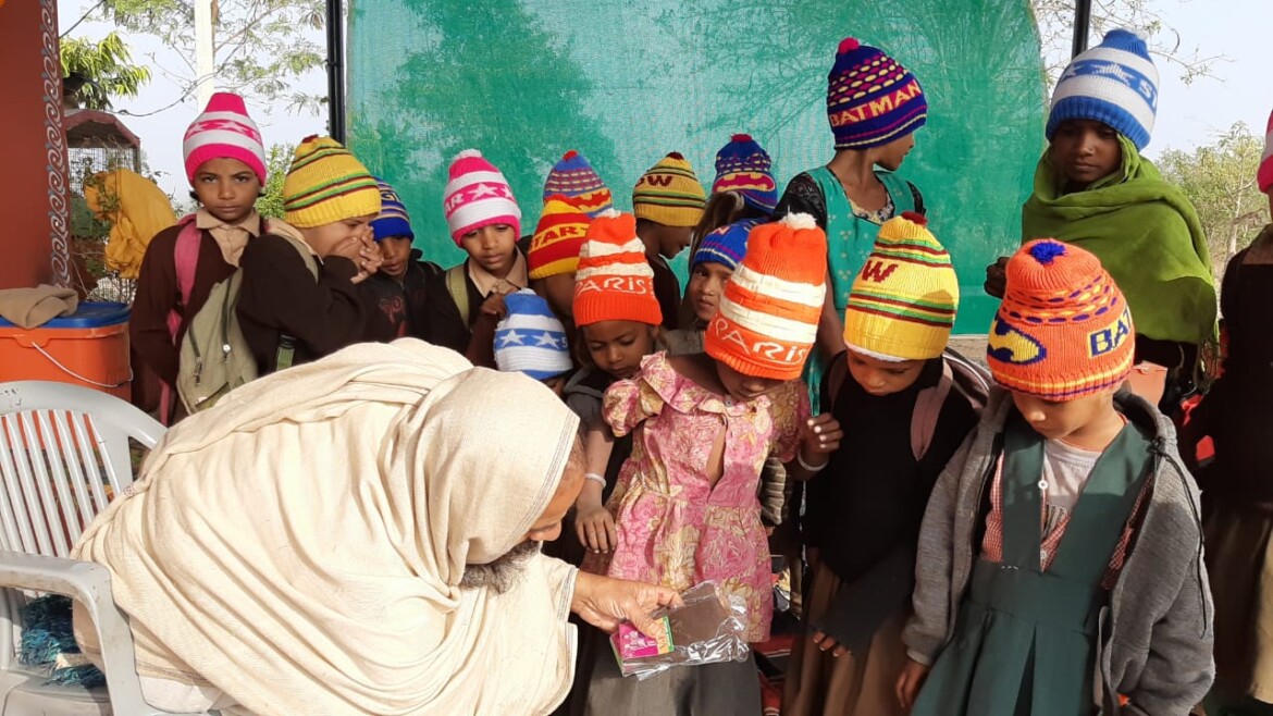 Mahant Sri Manohar Girdhari Das Ji Maharaj Performing Vastra Daan Seva at Panchmukhi Balaji